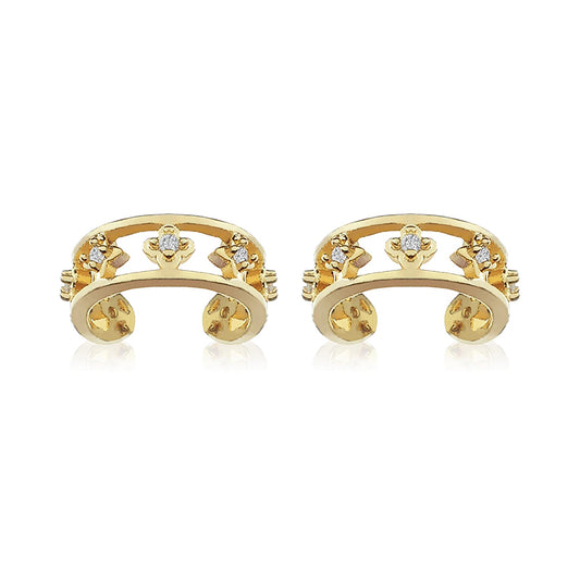 A pair of Lilyah Jewelry's 18k gold plated non piercing ear cuffs earrings with small clear gemstones displayed on a clean white background