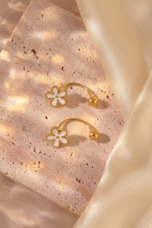 Lilyah Jewelry's printerest inspired 18k gold plated white flower earrings with a round clasp.