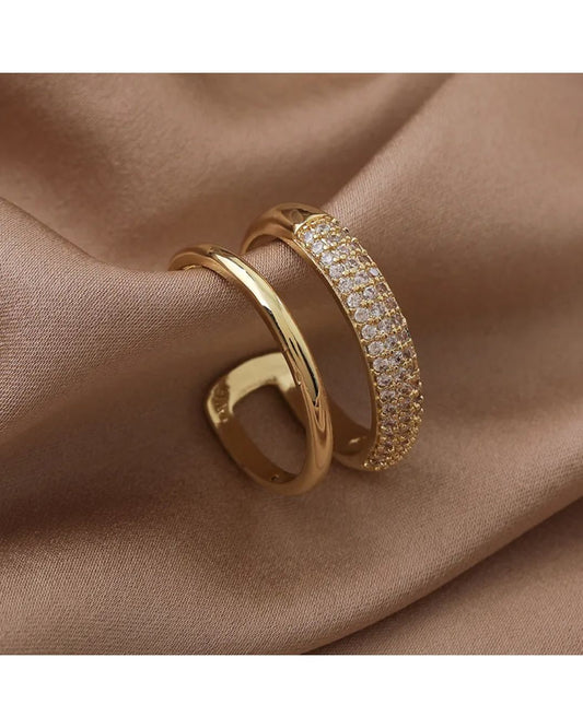 Lilyah Jewelry Gold Plated Zircon Diamond Ring. adjustable promise ring. accents of gold and diamonds. 
Two layers to the ring, one gold plated band and the other has diamonds.