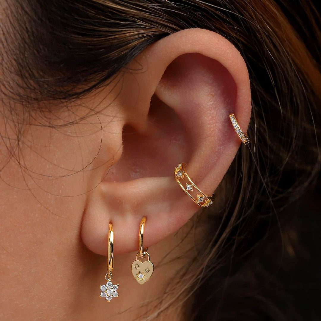 Lilyah Jewelry's 18K gold plated non piercing ear cuff with zircon inlay displayed on model's ear.