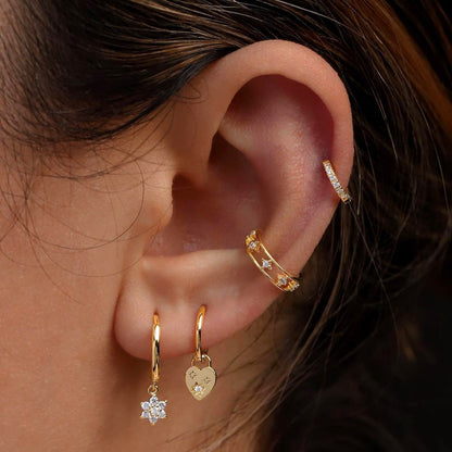 Lilyah Jewelry's 18K gold plated non piercing ear cuff with zircon inlay displayed on model's ear.
