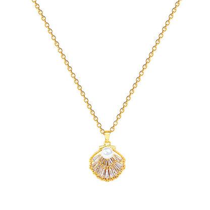 Lilyah Jewelry's 18k gold plated scallop-shaped pendant featuring a central white pearl and clear rhinestones, shown against a plain white background.