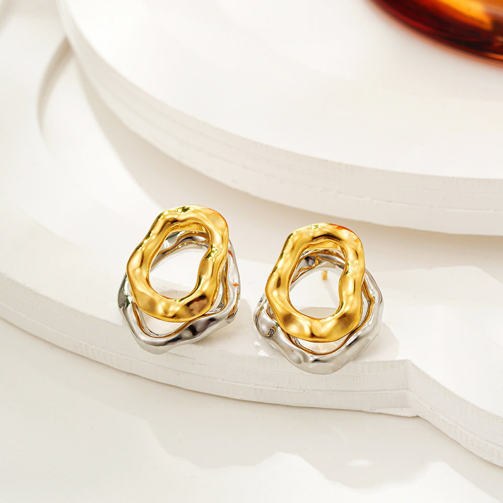Lilyah Jewelry Gold Plated Earrings.  Gold and silver earrings on a white surface
