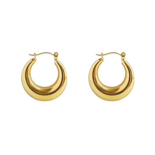 A pair of 18k gold plated chunky hoop earrings on a white background. Lilyah Jewelry Gold Plated Earring. Gift Ideas for her.